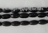 CTO116 15.5 inches 5*10mm faceted rice black tourmaline beads