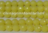 CTU2524 15.5 inches 6mm faceted round synthetic turquoise beads