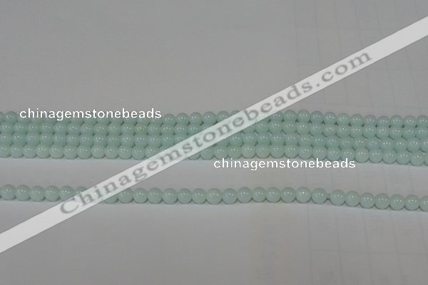 CTU2563 15.5 inches 4mm round synthetic turquoise beads