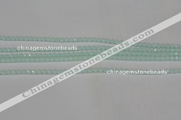 CTU2571 15.5 inches 4mm faceted round synthetic turquoise beads