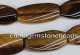 CTW103 15.5 inches 15*30mm twisted rectangle tiger eye beads