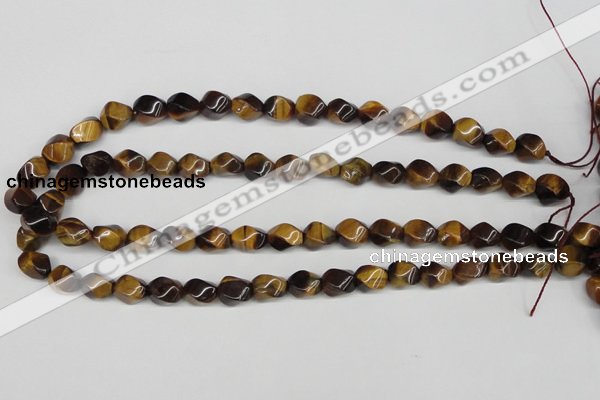 CTW151 15.5 inches 8*11mm twisted rice yellow tiger eye beads