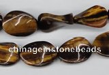 CTW63 15.5 inches 13*18mm twisted oval yellow tiger eye beads