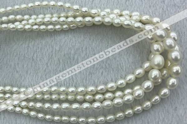 FWP212 15 inches 4mm - 9mm rice white freshwater pearl strands