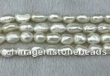 FWP285 15 inches 9mm - 10mm baroque white freshwater pearl strands