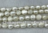 FWP302 15 inches 11mm - 12mm baroque white freshwater pearl strands