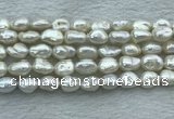 FWP351 15 inches 8mm - 9mm baroque white freshwater pearl strands