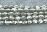 FWP351 15 inches 8mm - 9mm baroque white freshwater pearl strands